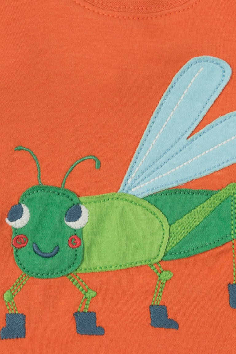 barntroja-kortarm-applikation-grashoppa-narbild