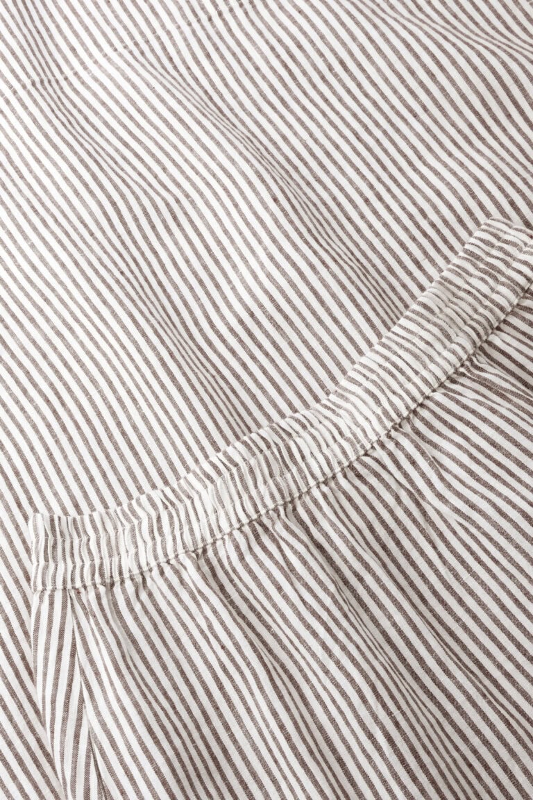 ekologisk-linnekjol-dam-randig-brun-narbild